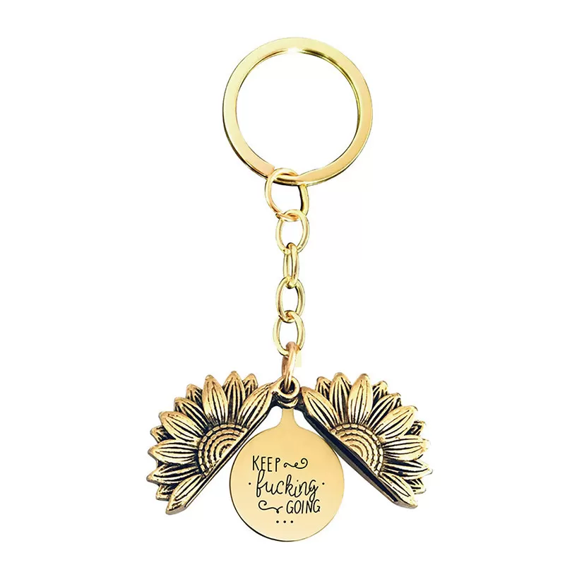 INF Nyckelring av gyllene solros med graverat hänge